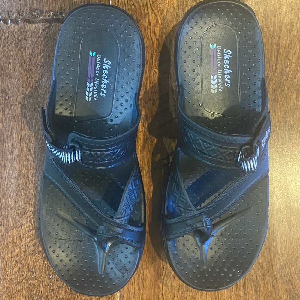 Skechers Foamies.  NIB size 9.  Do not have new tags, but have never been worn.